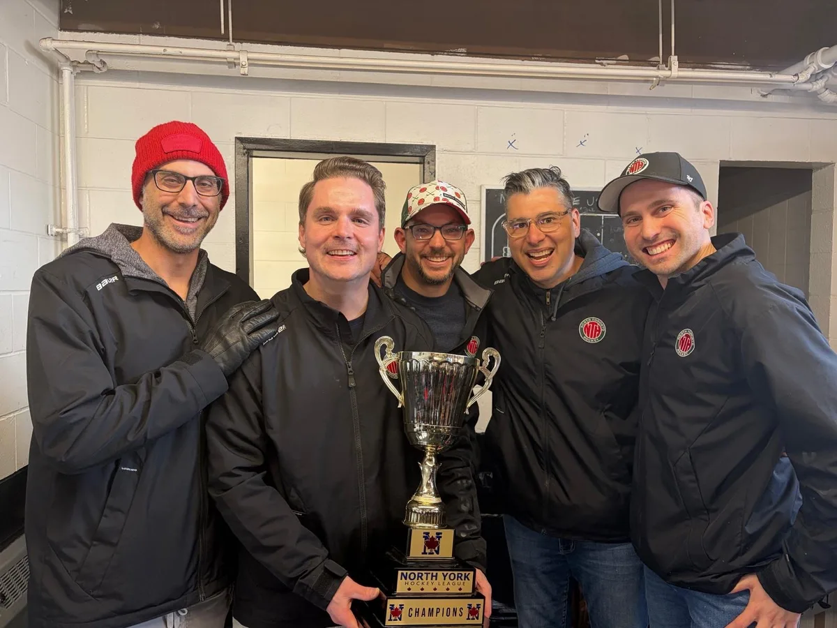 North Toronto U10 Select coaches posing with the NYHL U10 Tier 1 League championship trophy