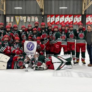 NT U15 Select team posing on the ice with medals and the championship trophy after winning the West Mall Lightning U15 A Tournament